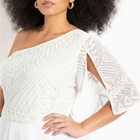 One shoulder white jumpsuit from Eloquii.
Size 18
Beaded detail on top.
Purchase - Picture 3 of 11